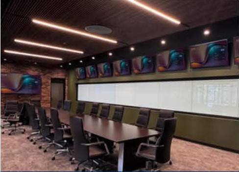 Corporate headquarters boardroom with a video wall