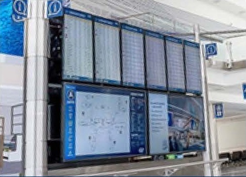 Lobby digital signage wall displaying wayfinding information